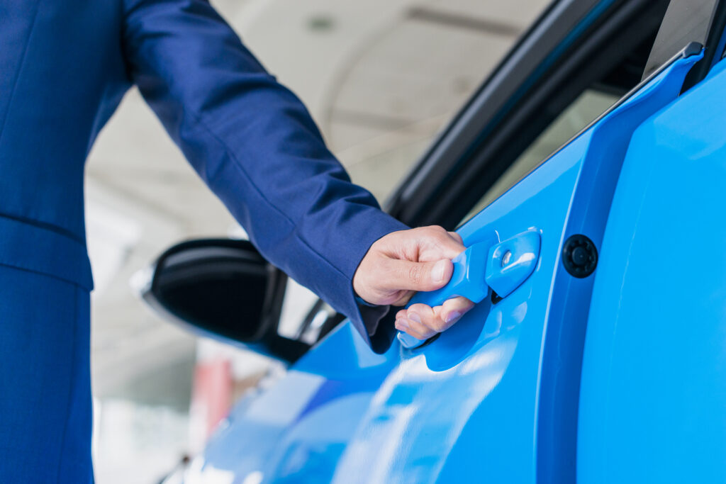 man-opening-car-door